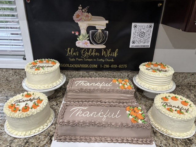 Set of fall-themed cakes with pumpkin piping