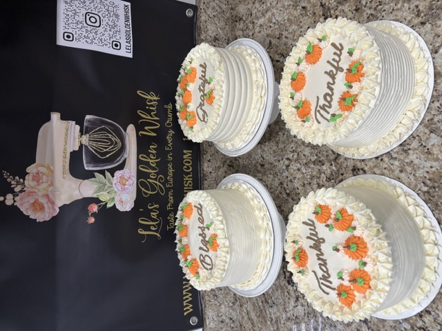 Four autumn cakes with pumpkin piping and script greetings