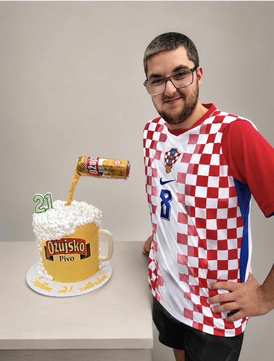 Beer mug shaped 21st birthday cake with a pouring can topper