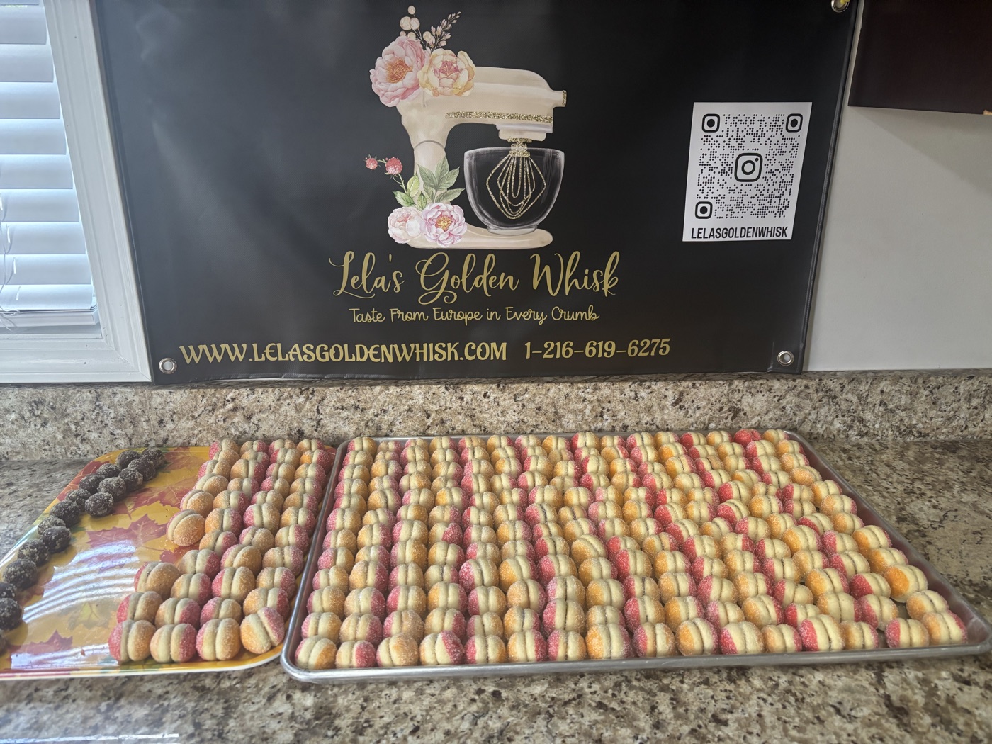 Rows of colorful peach-shaped cookies