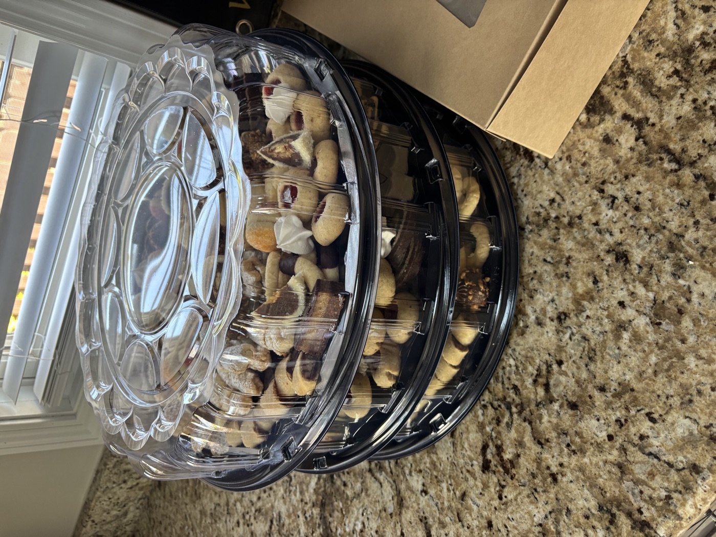 Stacked cookie trays with clear lids