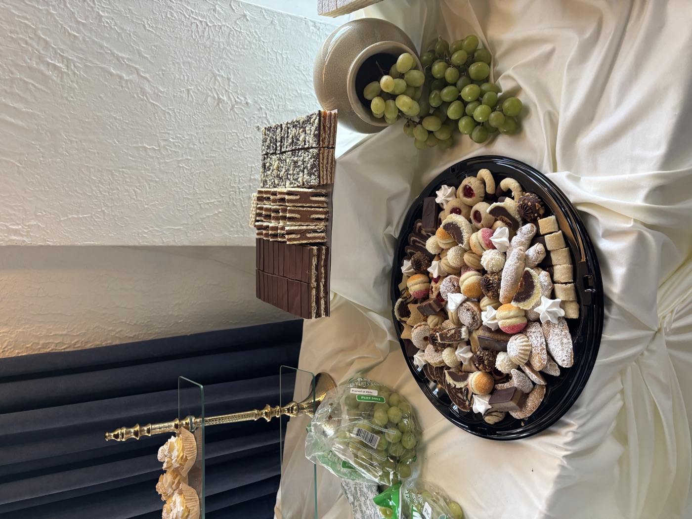 A celebration table with assorted cookies and pastries
