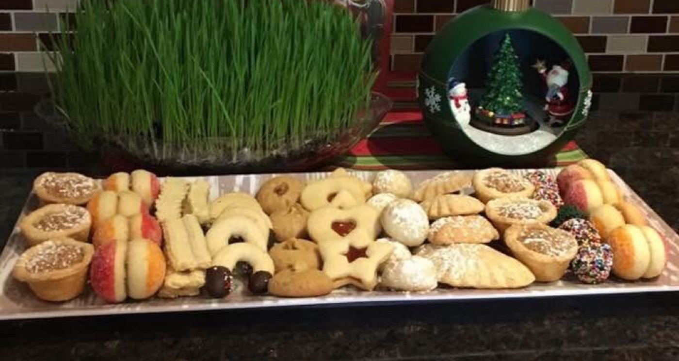 An assortment of cookies displayed with festive decorations