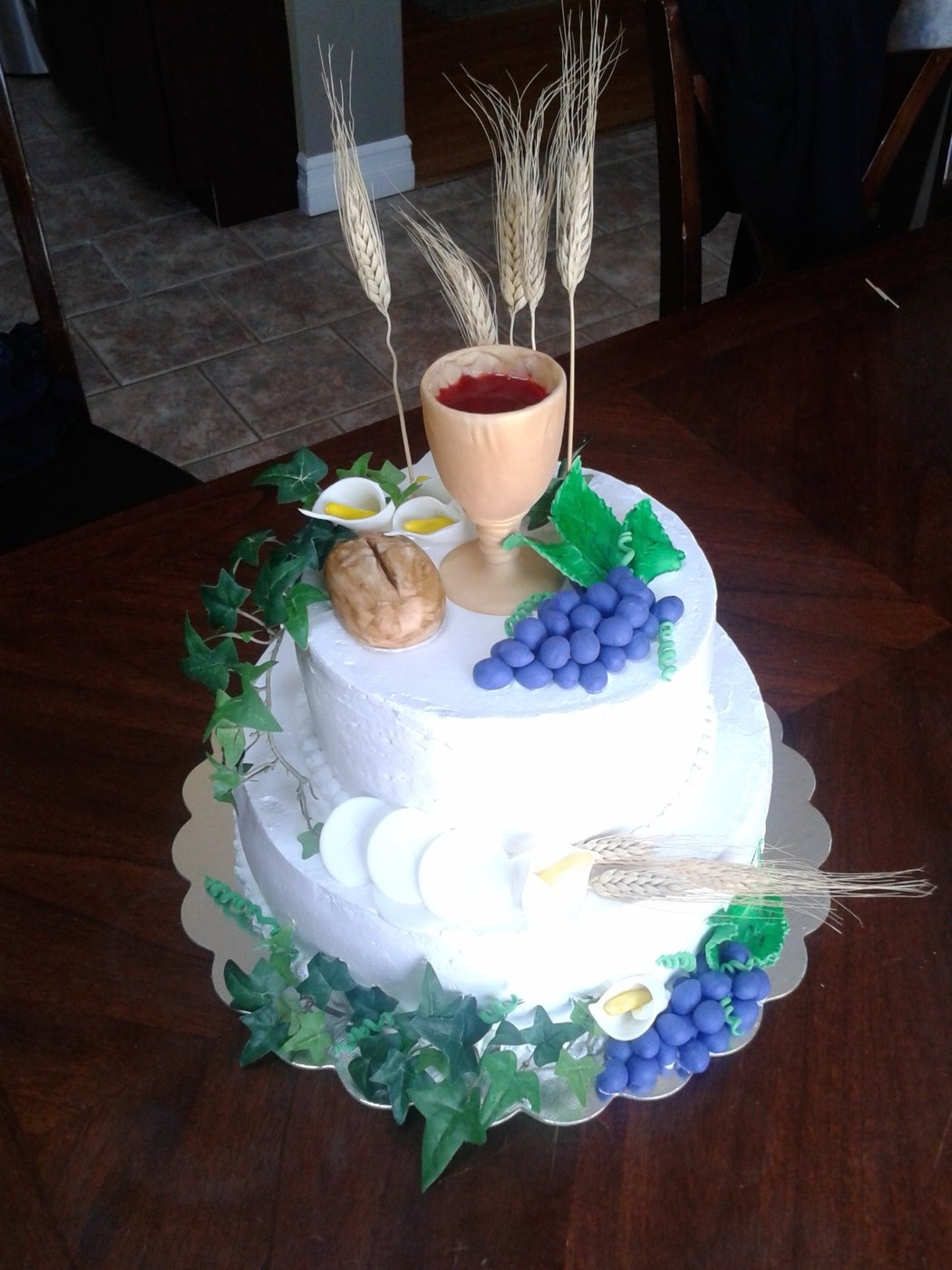 Floral cake with a decorative cup