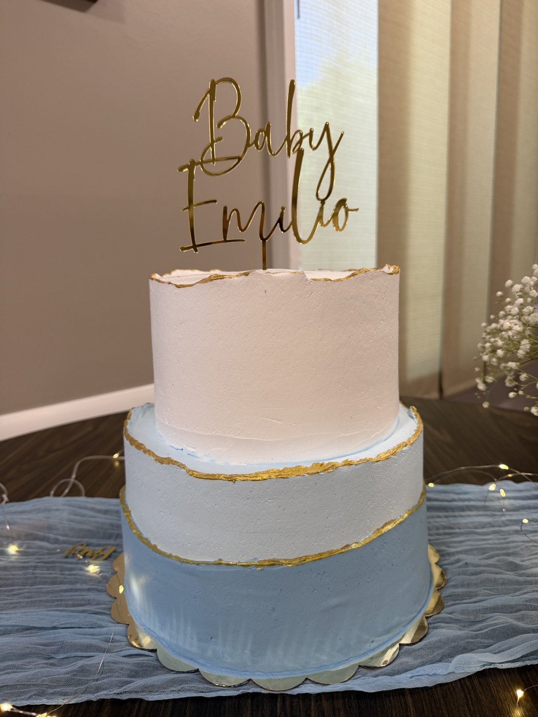 Blue and white tiered cake