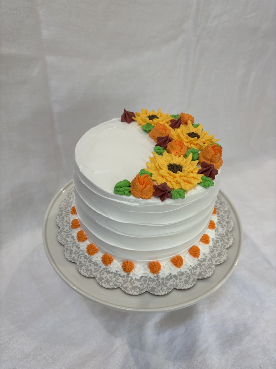 Floral cake with yellow accents