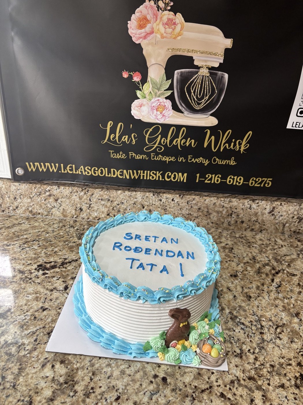 Blue and white celebration cake