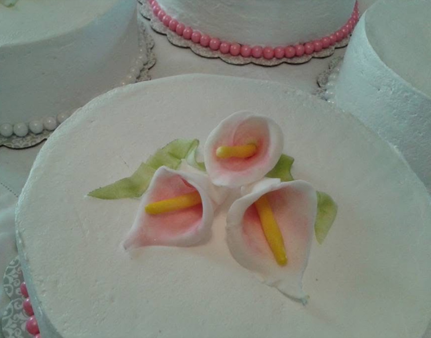 Pastel flowers decorating a cake