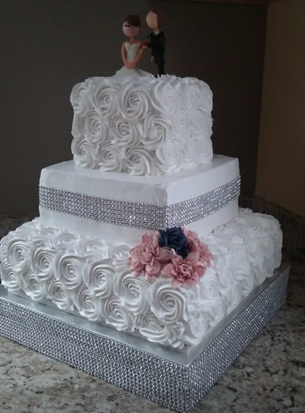 Square wedding cake with floral details