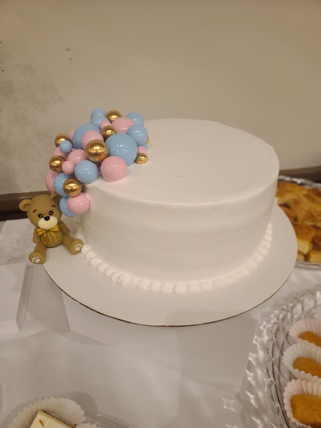 White cake with pastel flowers